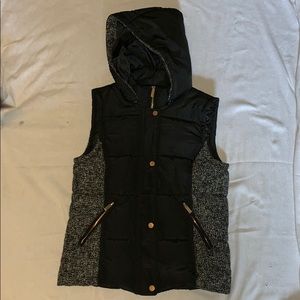 Black vest with white and black detailing